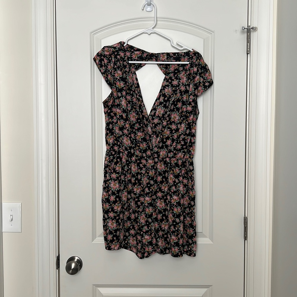 Floral romper. Nursing friendly. Cut out in back. Small. Pockets